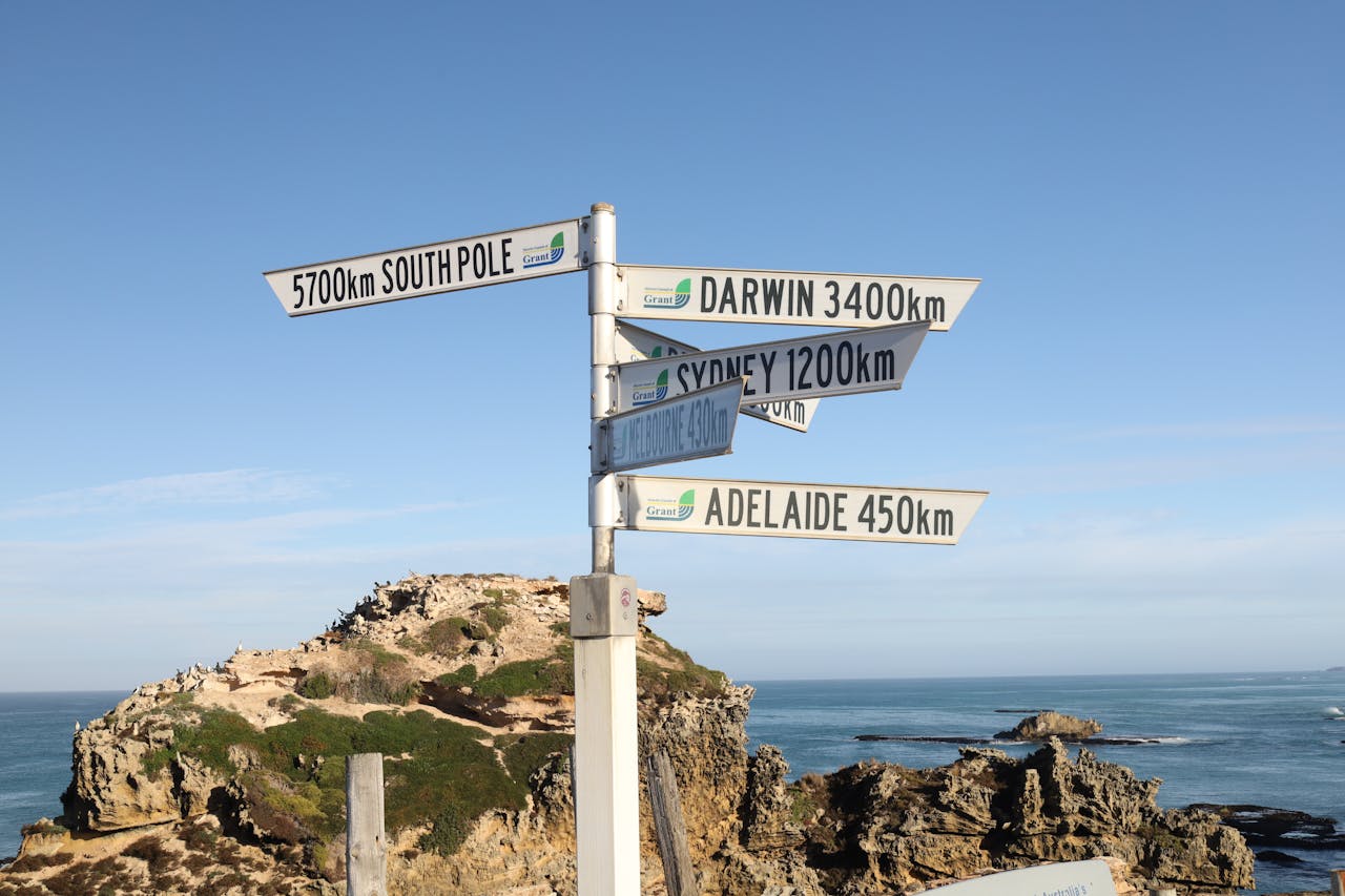 Signpost near Port Macdonnell with directions to major Australian cities and landmarks.