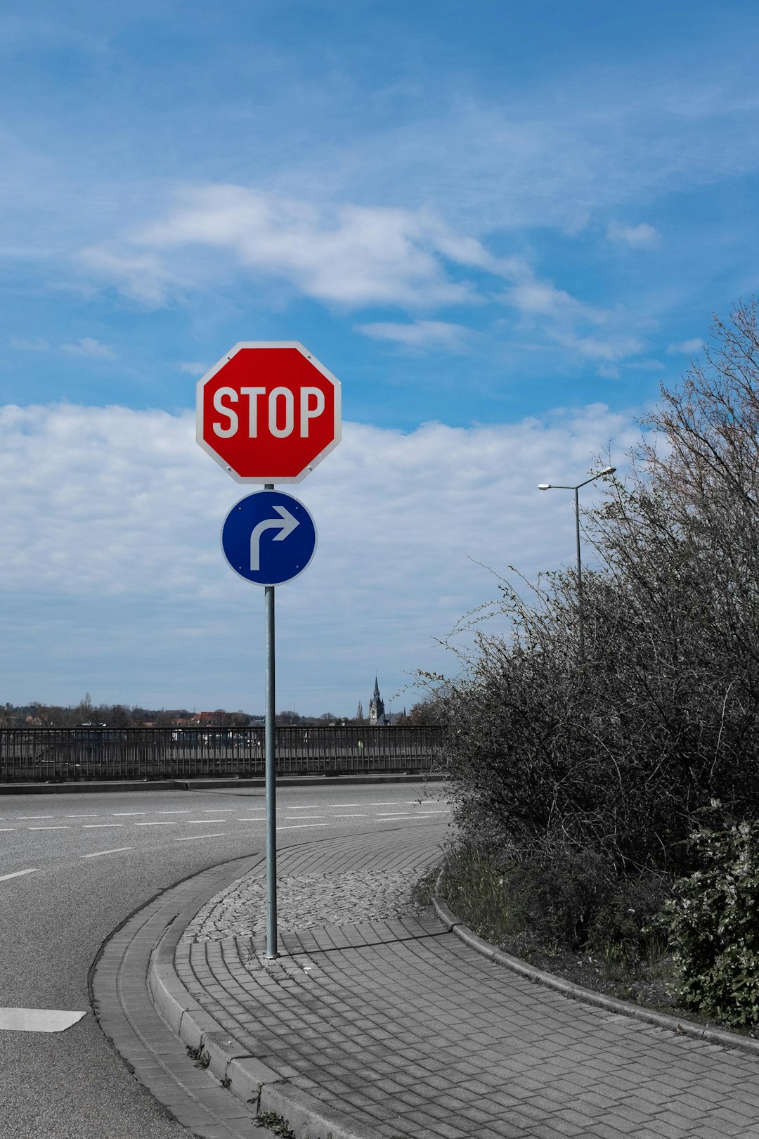 stop-sign-on-road-during-daytime-vaugz0s98pi